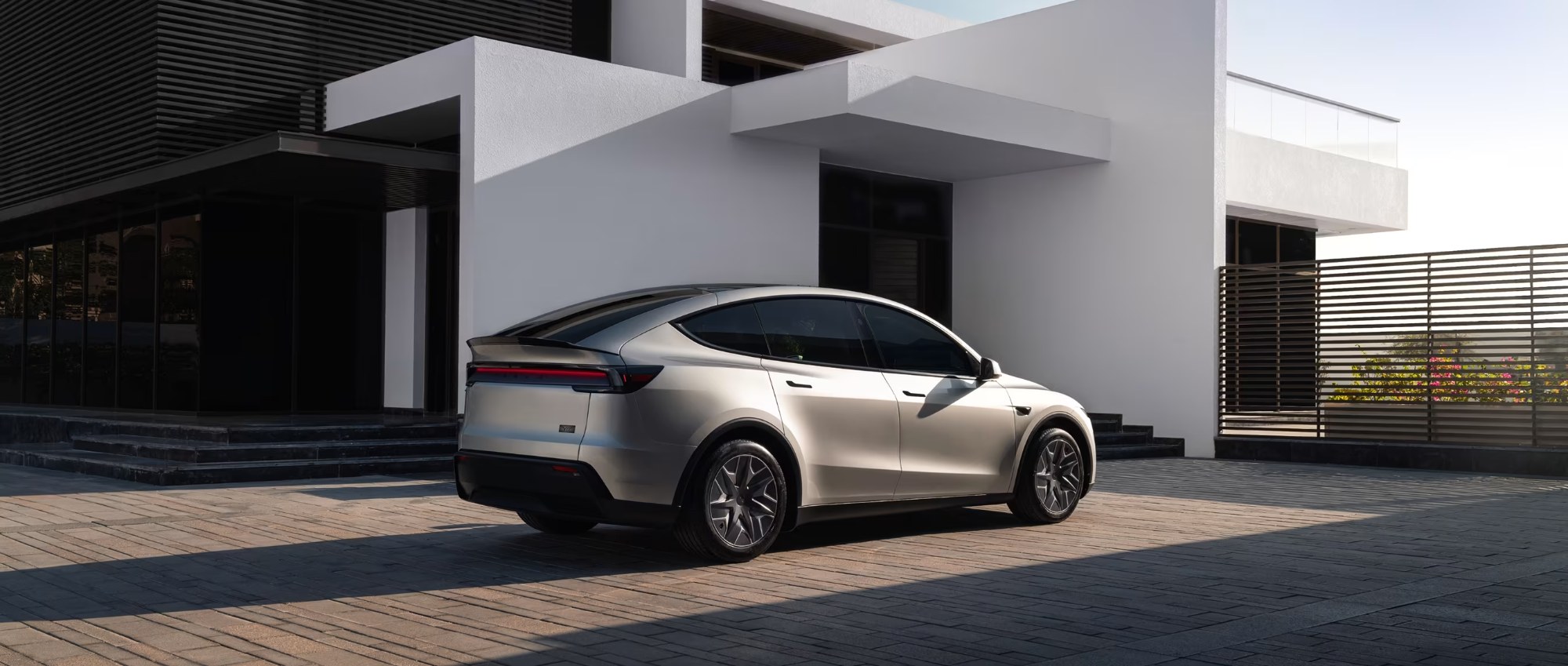 tesla launches model y long wheelbase with three rows and six seats